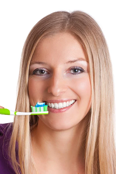 Женщина с зубной щеткой — стоковое фото