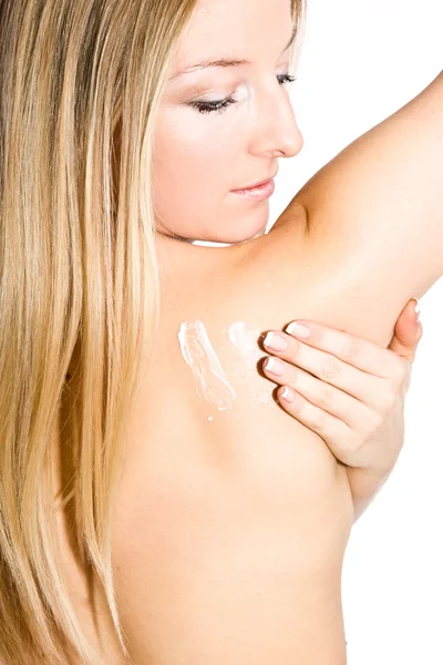 Woman creaming back — Stock Photo, Image