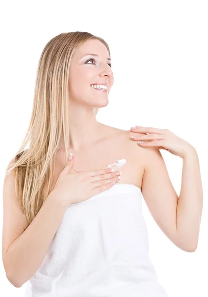 Woman creaming chest — Stock Photo, Image