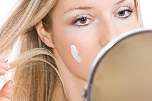 Woman makeup in mirror — Stock Photo, Image
