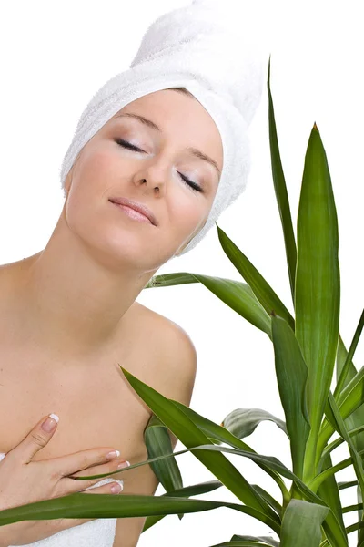 Woman in towel on head and green — Stock Photo, Image