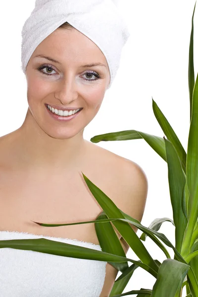 Woman in towel on head and green — Stock Photo, Image
