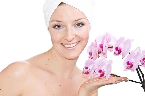 Woman with orchids — Stock Photo, Image
