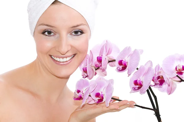 Woman with orchids — Stock Photo, Image