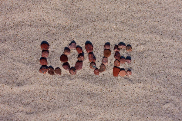 Love sign on sand — Stock Photo, Image