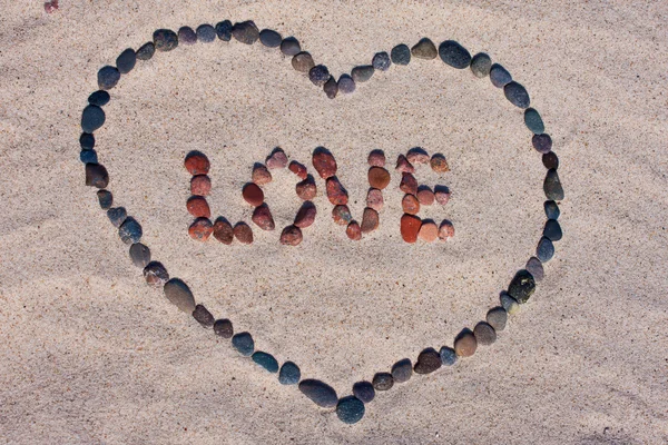 Liebeszeichen auf Sand — Stockfoto