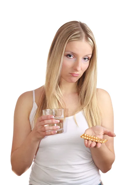 Mulher segurando pílulas anticoncepcionais — Fotografia de Stock