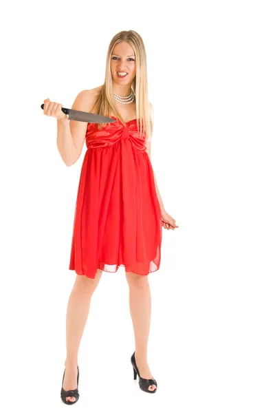 Mulher de vestido vermelho com faca — Fotografia de Stock