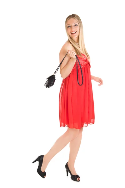 Καυκάσιος γυναίκα ξανθιά σε κόκκινο φόρεμα — Φωτογραφία Αρχείου