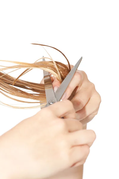 Жінка різання волосся — стокове фото