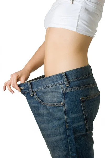 Mujer en jeans demasiado grandes — Foto de Stock