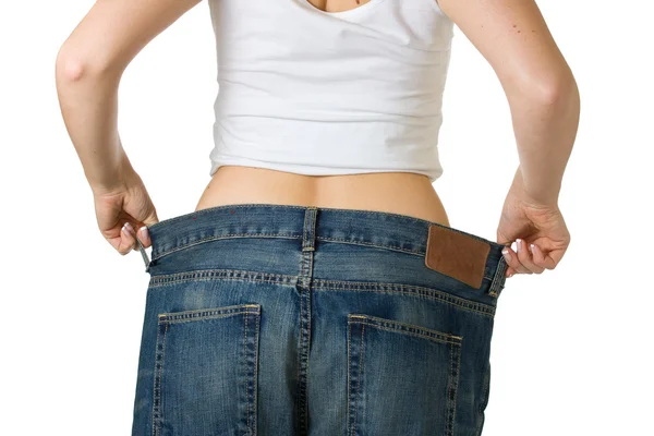 Mulher em jeans muito grandes — Fotografia de Stock