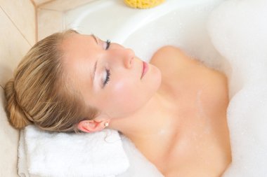 Blond woman in bath clipart