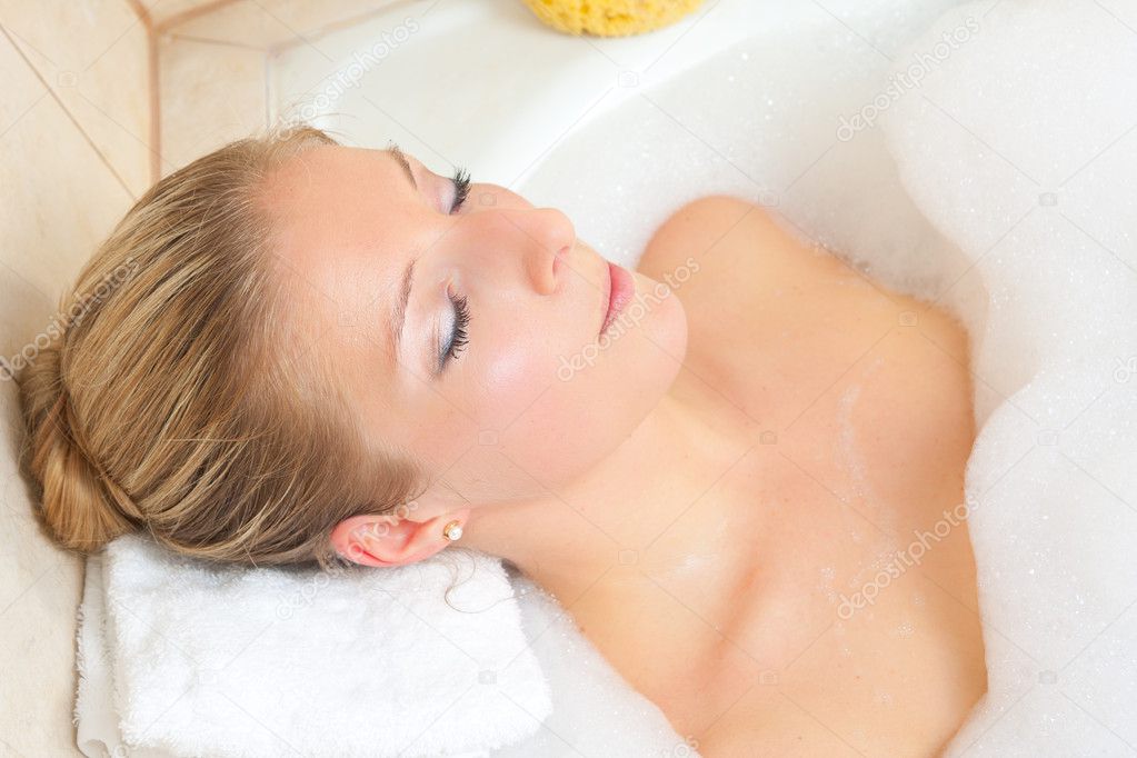 Blond woman in bath