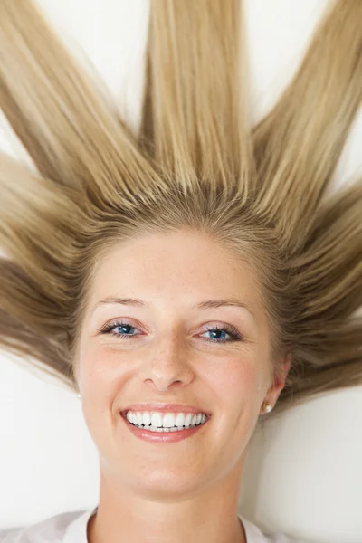 Woman with sun rays like hair — Stock Photo, Image