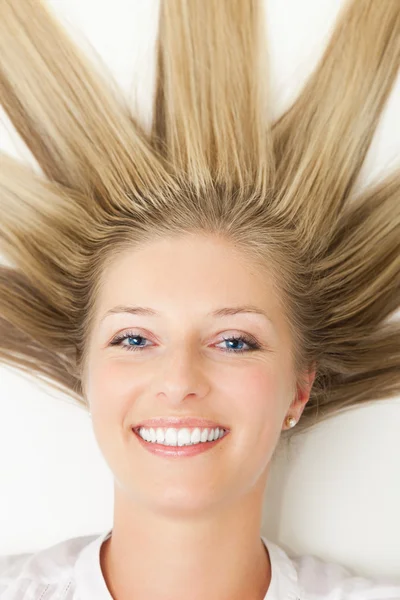 Woman with sun rays like hair — Stock Photo, Image