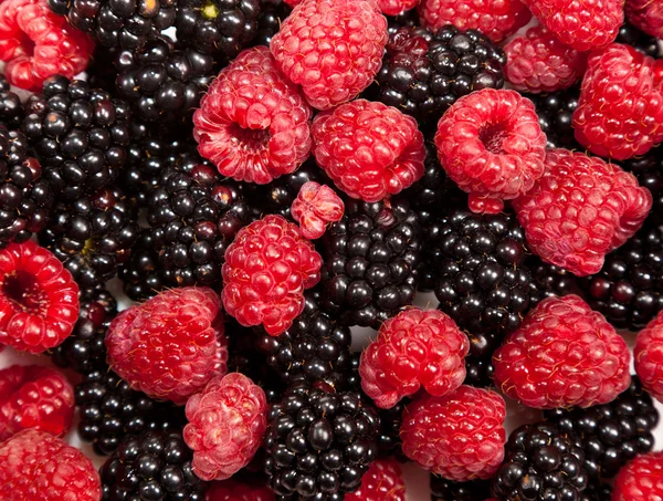 stock image Composition of ripe black and red raspberries and strawberries