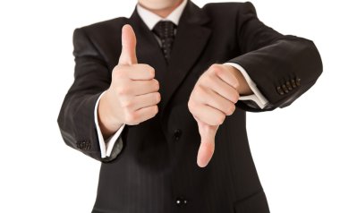 Business man in suit thumbs up and down on white isolated backgr clipart