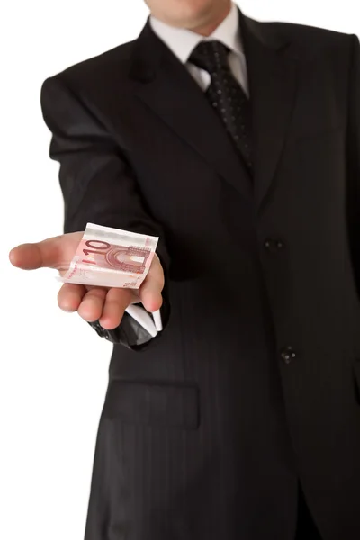 Homem de negócios segurando dinheiro em fundo isolado branco — Fotografia de Stock
