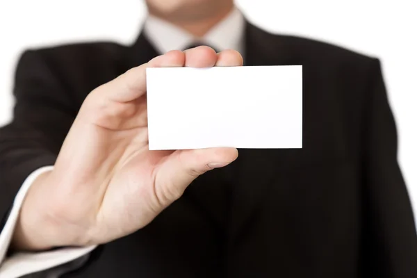 Hombre de negocios sosteniendo la tarjeta en blanco sobre fondo aislado blanco — Foto de Stock