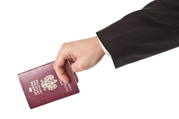 Чоловік у костюмі тримає паспорт — стокове фото