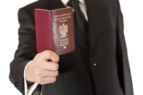 Homem de terno segurando passaporte — Fotografia de Stock