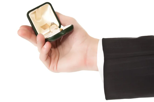 Férfi öltöny kezében eljegyzési gyűrű, elszigetelt fehér alapon — Stock Fotó