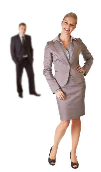 Femme d'affaires avec homme d'affaires en arrière-plan — Photo