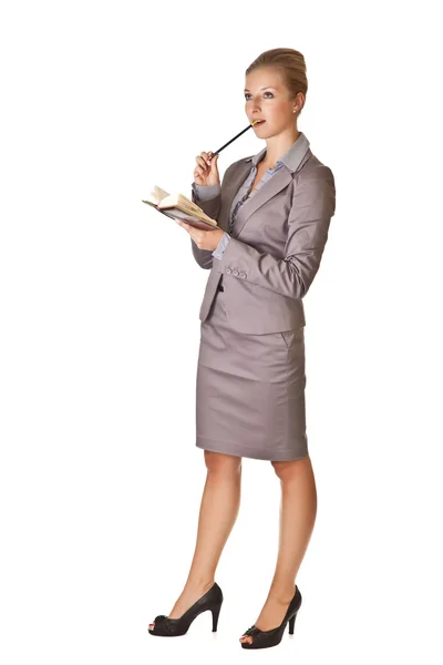Mulher de negócios loira caucasiana em terno segurando agenda calendário — Fotografia de Stock