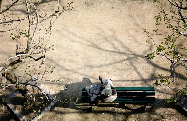 stock image Thinking on a bench