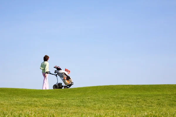 Golfer și caddy — Fotografie, imagine de stoc