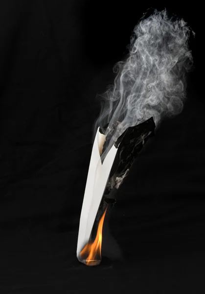 Paper airplane in flames — Stock Photo, Image