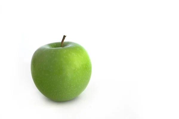 stock image Grenn Apple with flowers and reflection