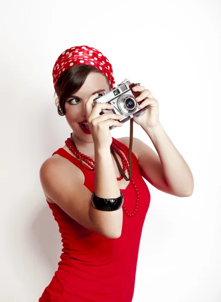 Pin-up ragazza con una fotocamera — Foto Stock