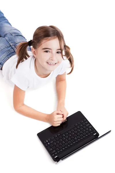 Little student girl with a laptop — Stock Photo, Image