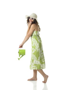 Woman with a watering can clipart