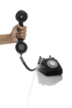 Male hand holding an hold vintage phone clipart