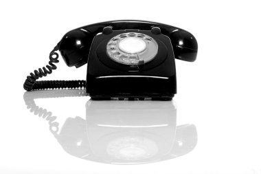 Vintage phone on a white background with reflection clipart