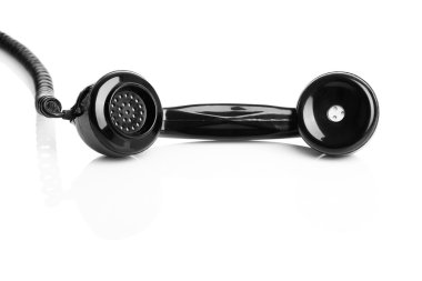 Telephone handset isolated over a white background, focus is on the handset clipart