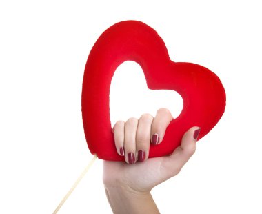 Woman holding a valentine hearth in the hand clipart