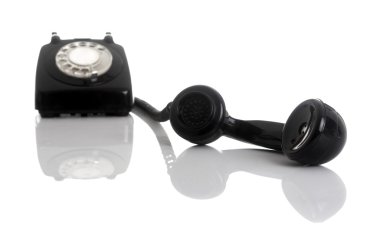 Retro phone with reflection, focus is in front (DOF) clipart