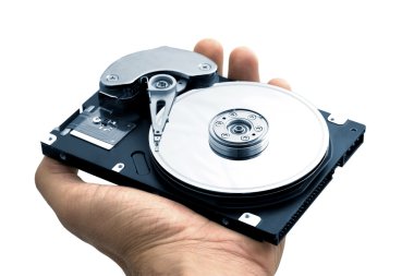 Hand with a open hard disk drive clipart