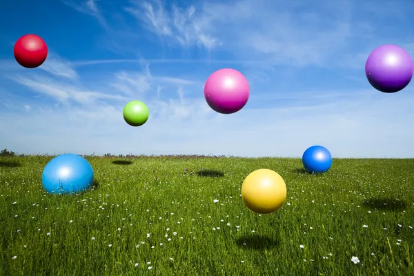 Colored Balls Jumping Green Meadow — Stock Photo, Image
