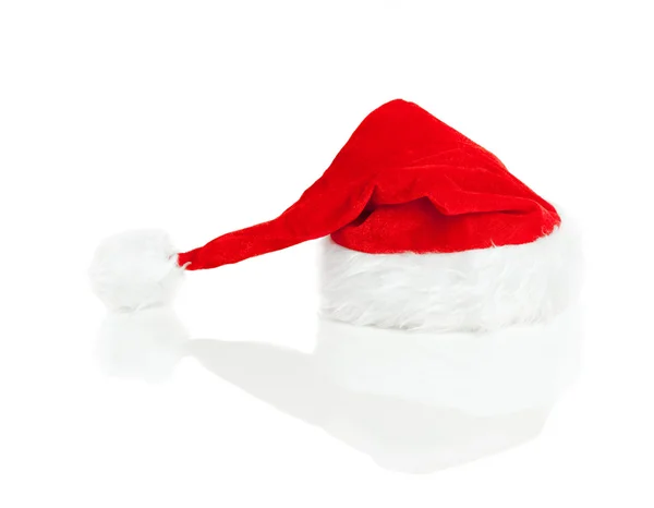 用反射在白色背景上孤立的圣诞老人帽子 — 图库照片