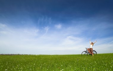 Girl with a bicycle clipart