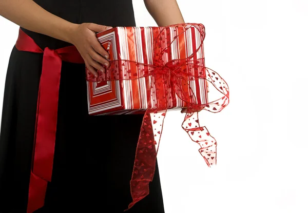 Hand with gifts — Stock Photo, Image