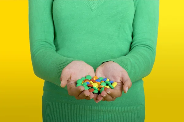Woman with candys — Stock Photo, Image