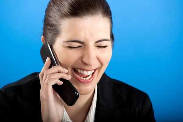 Feliz empresária a ligar ao telefone — Fotografia de Stock
