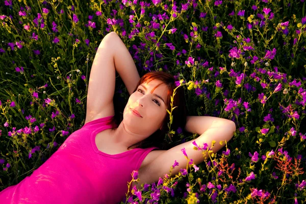 Lying on flowers — Stock Photo, Image