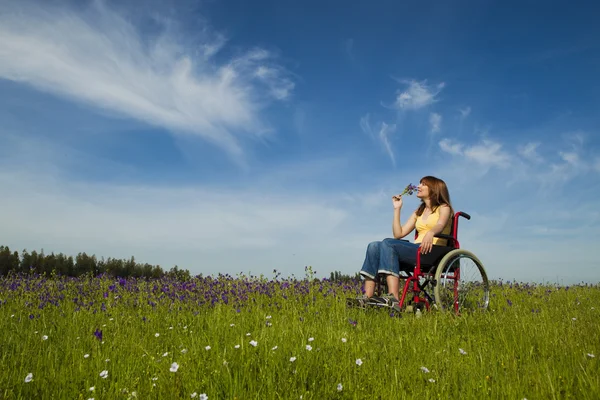 Handicapped woman on wheelchair — Stock Photo, Image